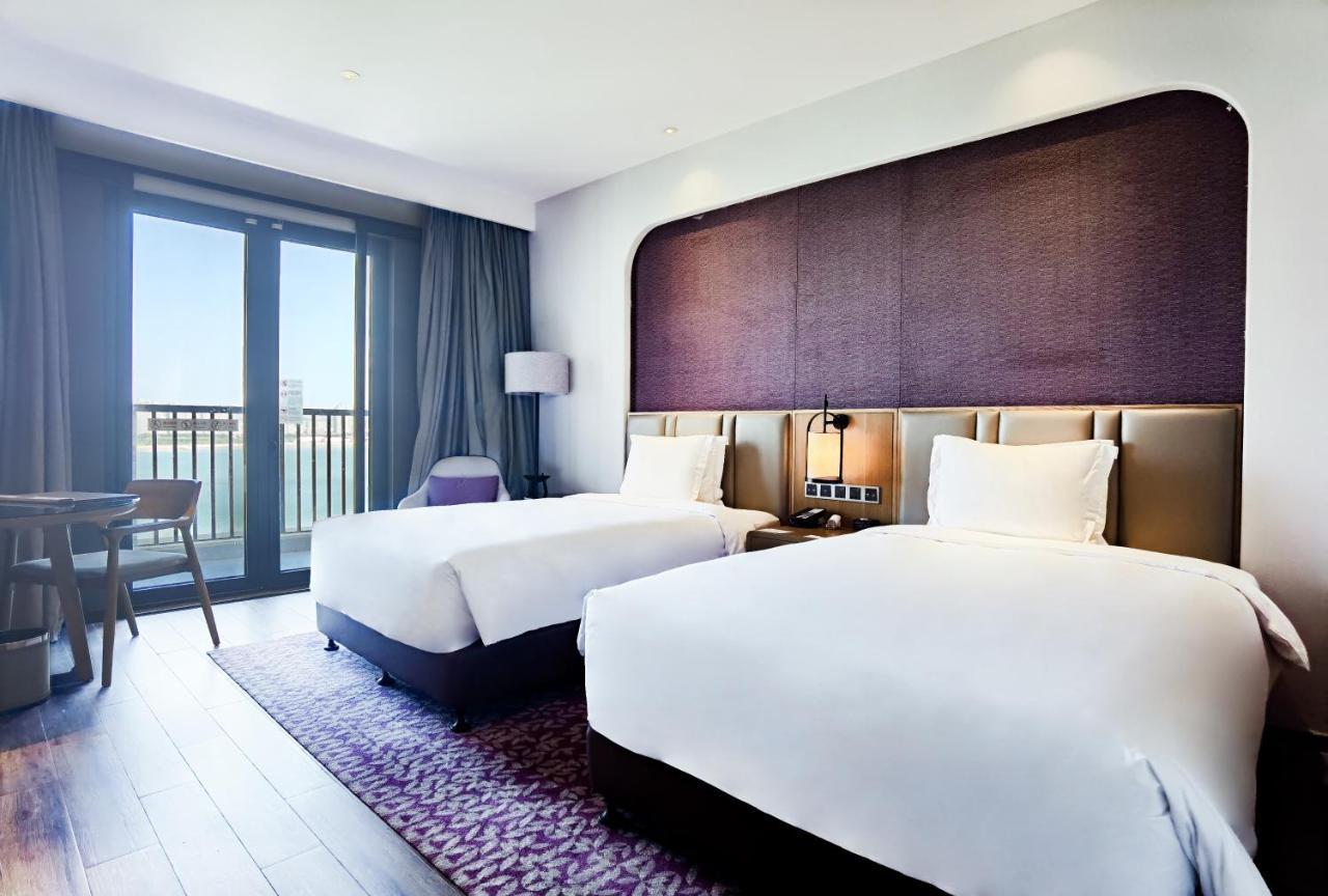 Crowne Plaza Qingdaoorientalmoviemetropolis By Ihg Otel Dış mekan fotoğraf